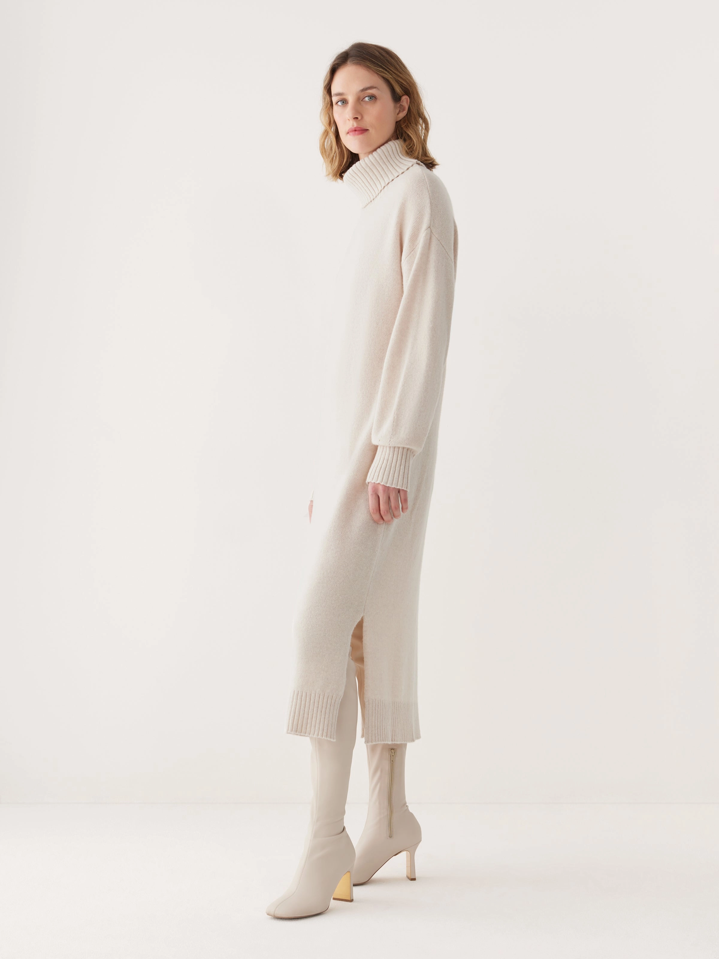 The Turtleneck Sweater Dress in Cream